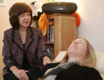 Rhoda Kopy (left) works with one of her clients,in Kopys Toms River practice, called Hypnosis for Women